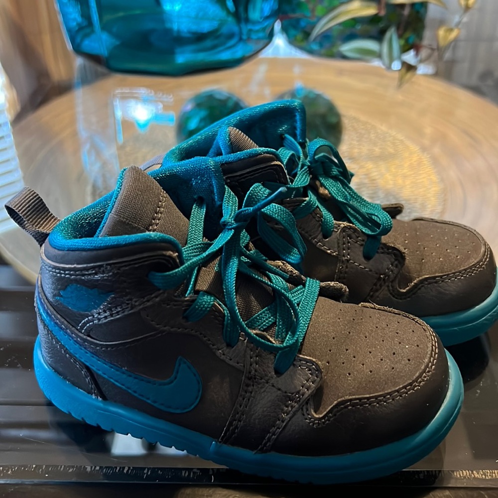 Boys size 7c blue and grey in color Jordan’s